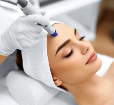 A patient receiving a soothing Hydrafacial treatment at Dr. Fahad Faizullah's dermatology clinic in Peshawar